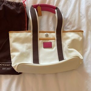 Coach white mini tote bag with brown handles and pink detailing